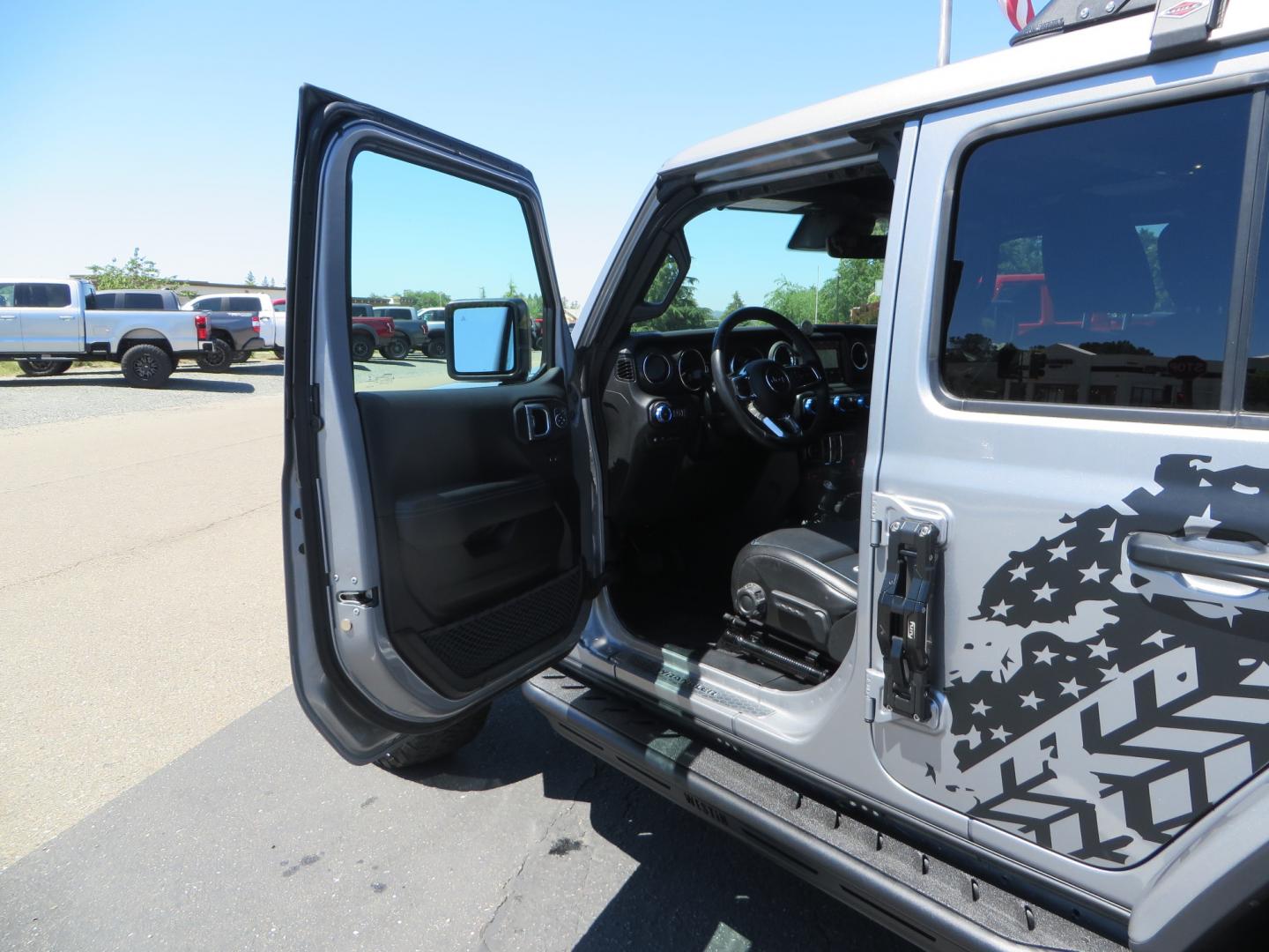 2021 SILVER /BLACK Jeep Wrangler Unlimited Rubicon 4XE 4d SUV 4wd (1C4JJXR63MW) with an 2.0L L4 DOHC 16V TURBO engine, automatic transmission, located at 2630 Grass Valley Highway, Auburn, CA, 95603, (530) 508-5100, 38.937893, -121.095482 - Impressive 4xe Rubicon with a ton of extras that include Fox 3.0 internal bypass front and rear shocks, 315 BFG KO2 tires, Warn winch, Factor 55 Ultra hook, Front bumper stinger, Rigid Pods on front bumper, Rigid A series lights in the roof rack, DV8 lockable hood pins, Westin Running boards, Fury d - Photo#26